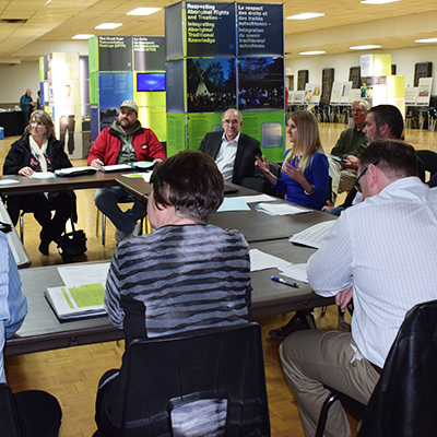 Michelle Dassinger of the NWMO is seen making a presentation about the new website to the South Bruce Community Liaison Committee.