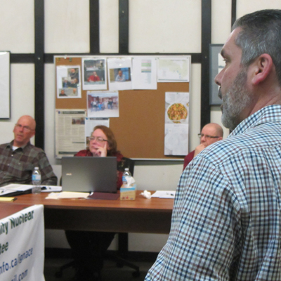 This image shows the NWMO's Derek Wilson giving a presentation to the Ignace Community Nuclear Liaison Committee. 