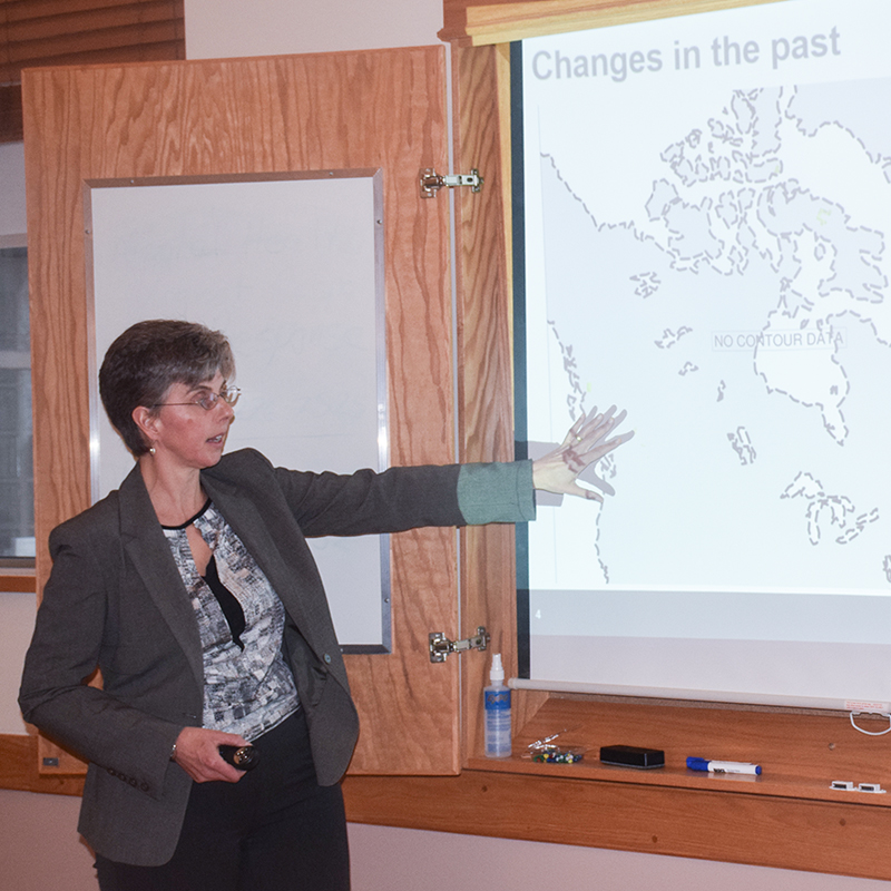 The photo shows NWMO geoscientist Monique Hobbs doing a presentation on the Greenland Analogue Project at a meeting of the Huron-Kinloss Nuclear Waste Community Advisory Committee.