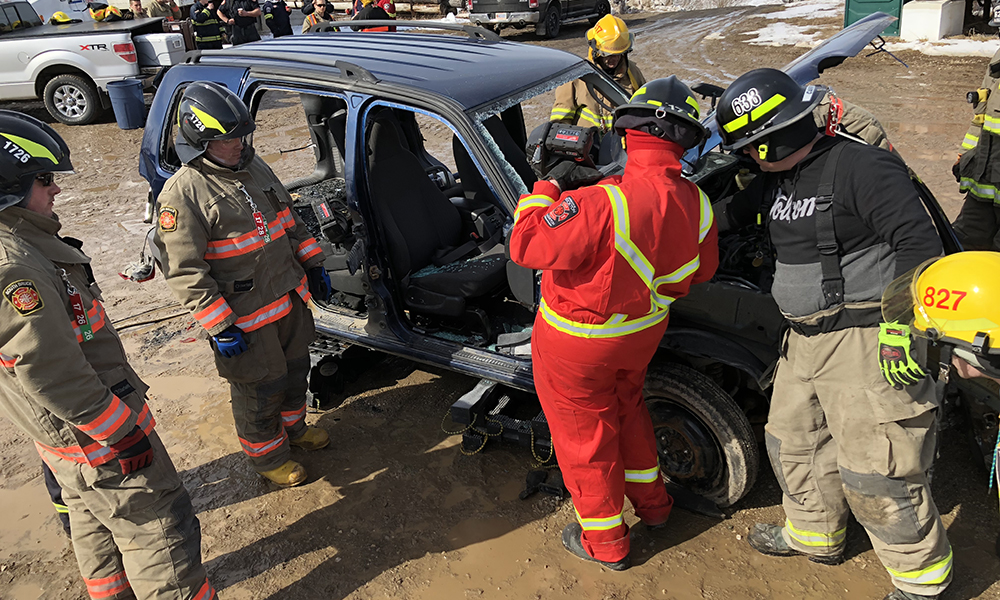 This photo shows a picture of a mock auto extrication at the Bruce County Fire School.