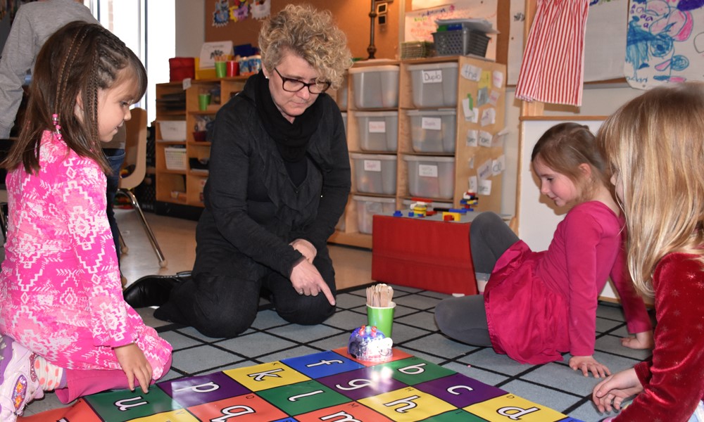 NWMO CEO Laurie Swami spent International Women’s Day sharing her vision of a “STEMinist” future. In this photo, Ms. Swami spends time in a classroom with some young girls. Supporting STEM-based education at a young age is one of the ways the NWMO seeks to increase diversity.
