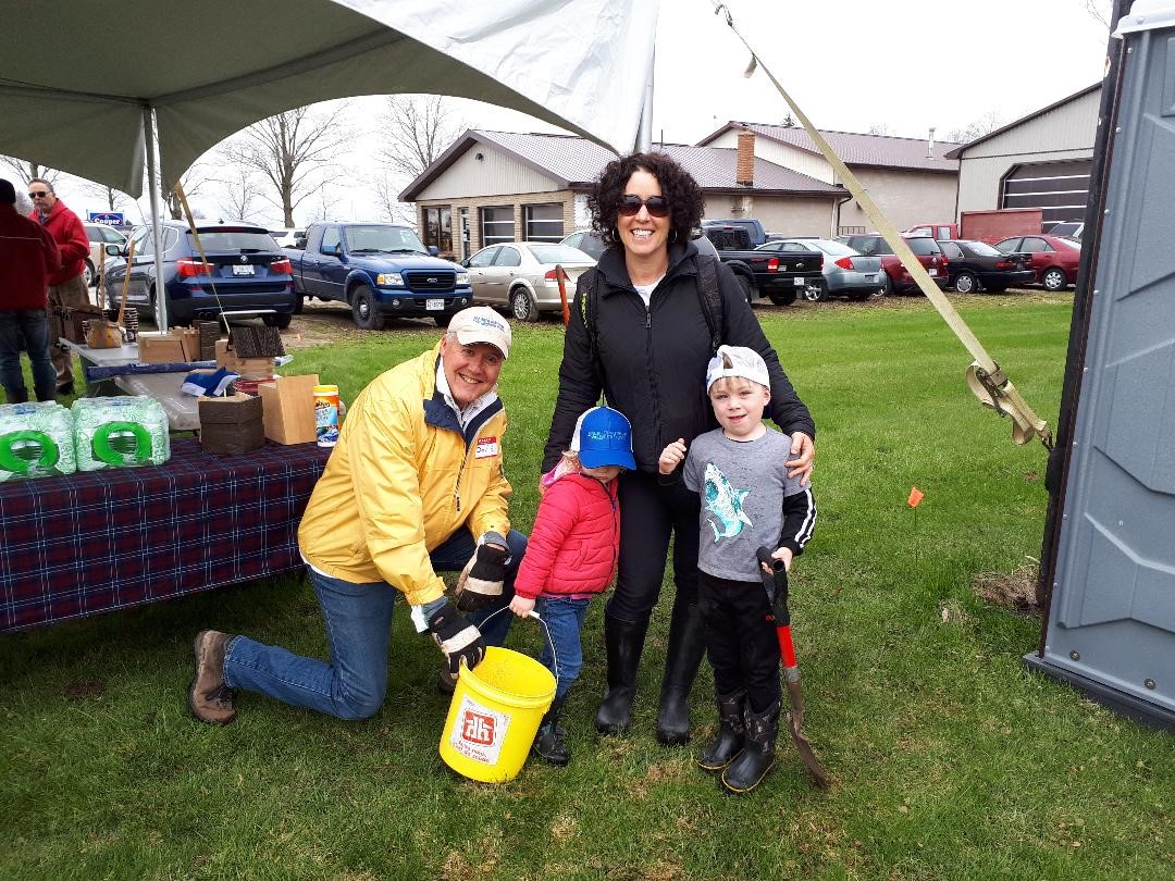 David Grant, board member of Pine River Watershed Initiative Network, and Becky Smith, Regional Communications Manager at the NWMO, help kick off the Pine River Watershed Initiative Network’s annual tree planting event.