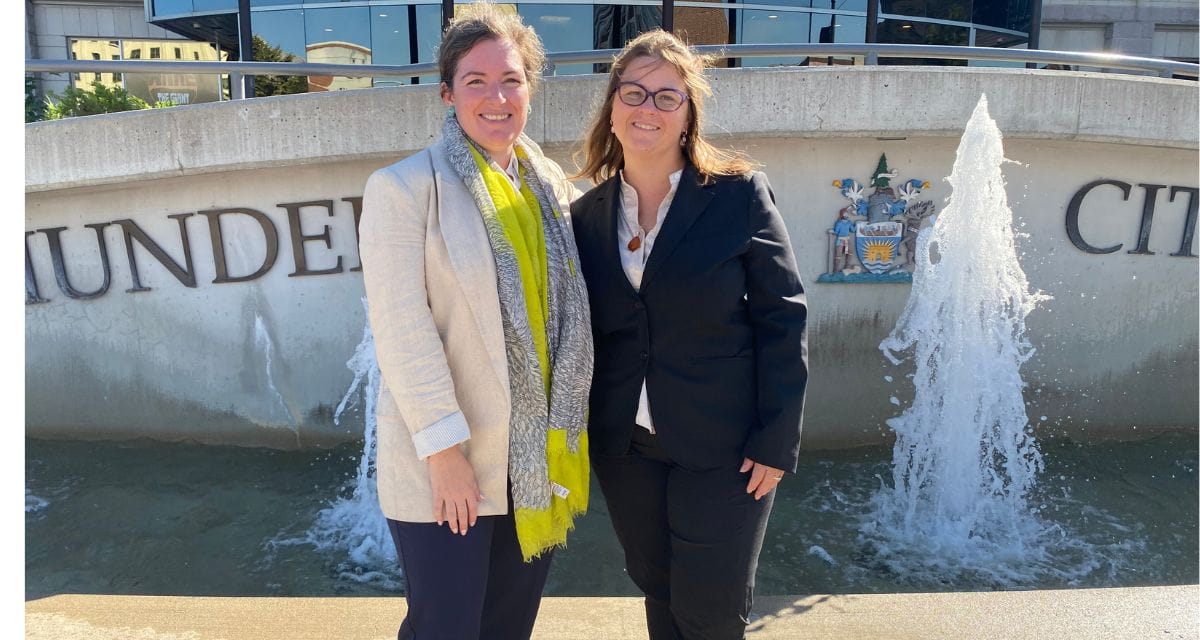 Caitlin Burley, Director, Strategic Programs & Transportation and Joanne Jacyk, Site Director, Ignace, in front of City Hall before giving their deputation to council