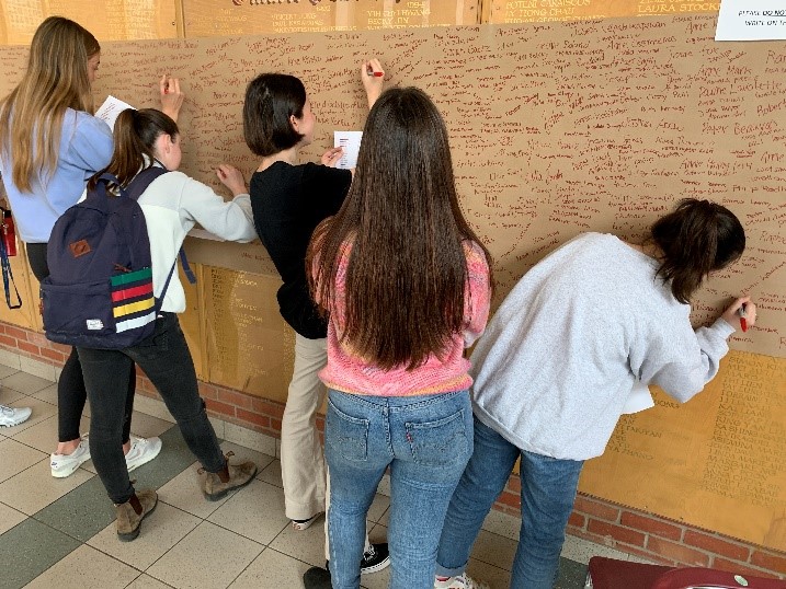 Reconciliation in action: As part of the Legacy Schools program, students at Riverdale Collegiate Institute write out the names of Indigenous children who died in residential schools.