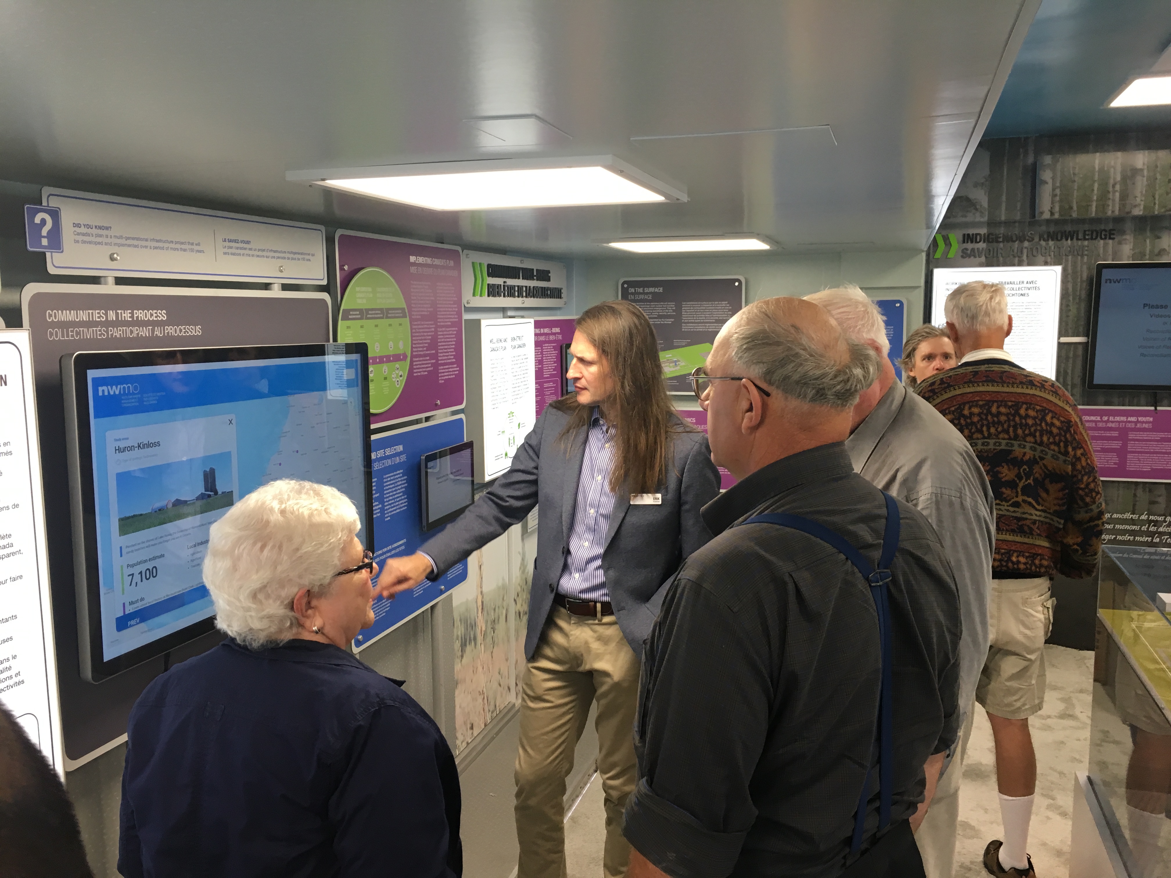 Erik Kremer, Section Manager of Safety Assessment (centre) takes community members from Huron-Kinloss through the NWMO’s New Mobile Learn More Centre that was debuted at the 2nd Huron-Kinloss Nuclear Waste Symposium in late August.