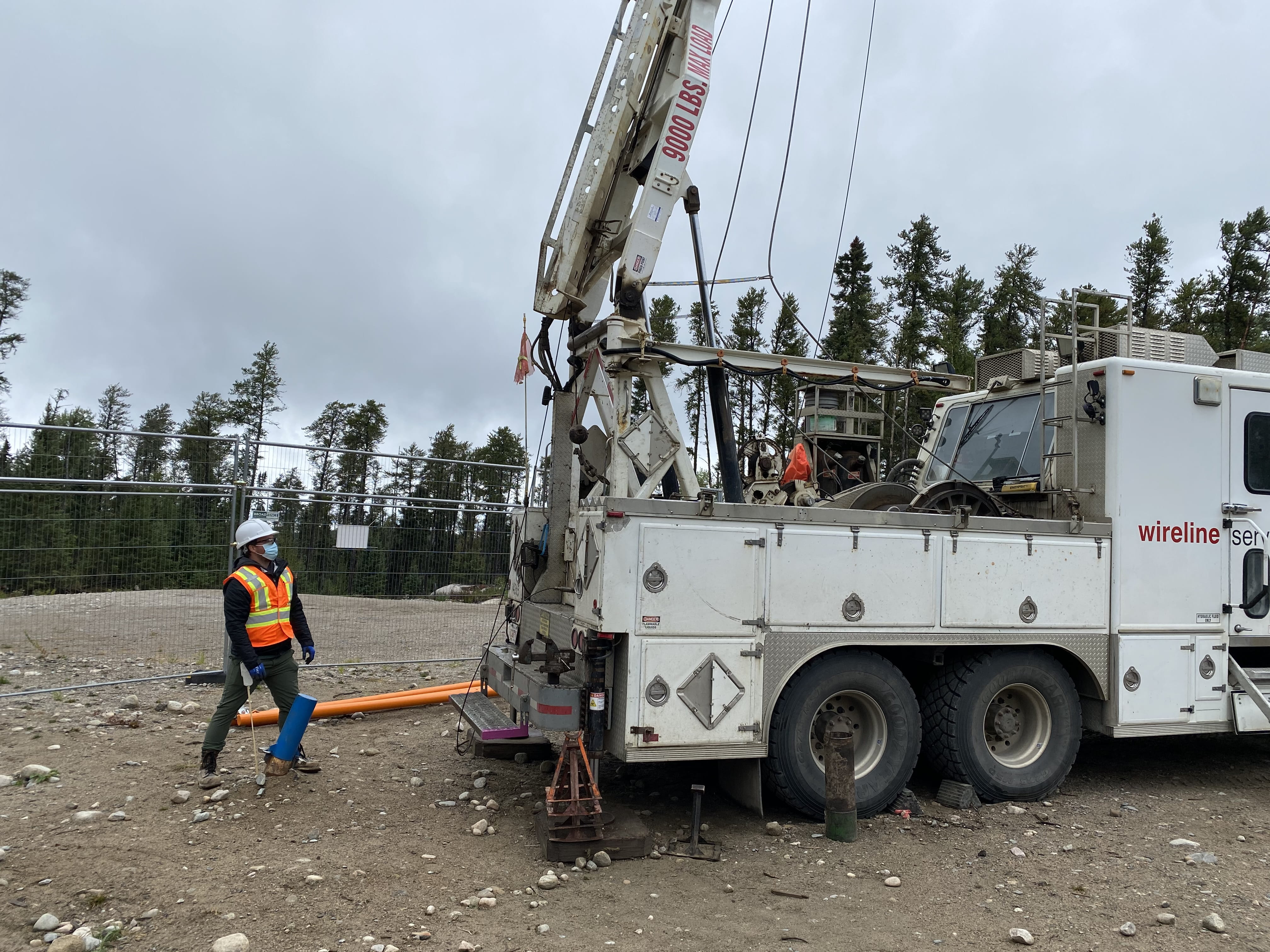 Dr. Jeff Binns standing next to the borehole worksite following the successful installation of Engineered Barrier Science test modules.