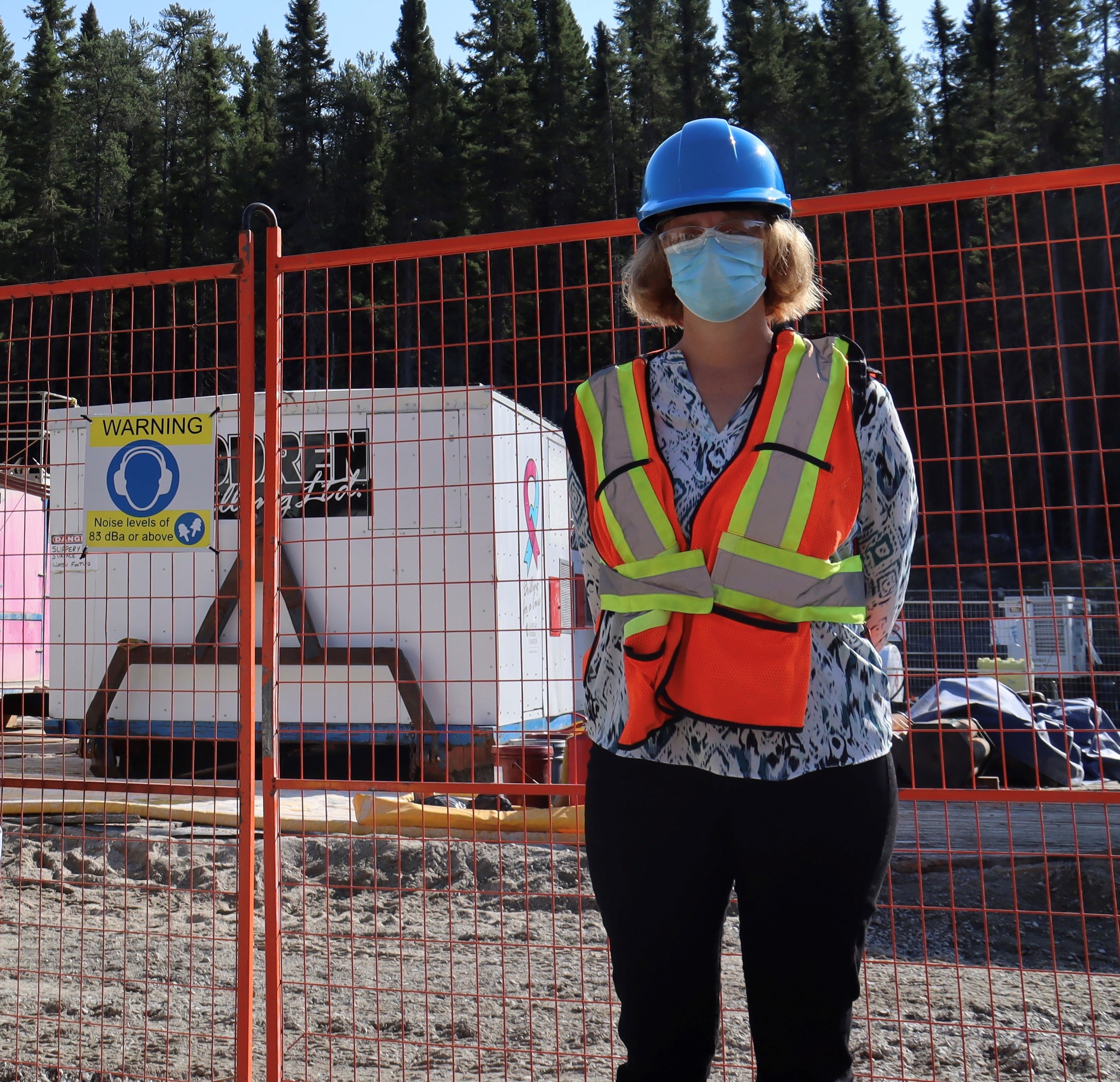 Image of Lise Morton wearing a construction hat, 
