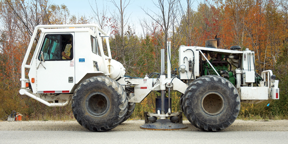 This is an image of a vibroseis truck, which is used to conduct 2-D seismic surveys.