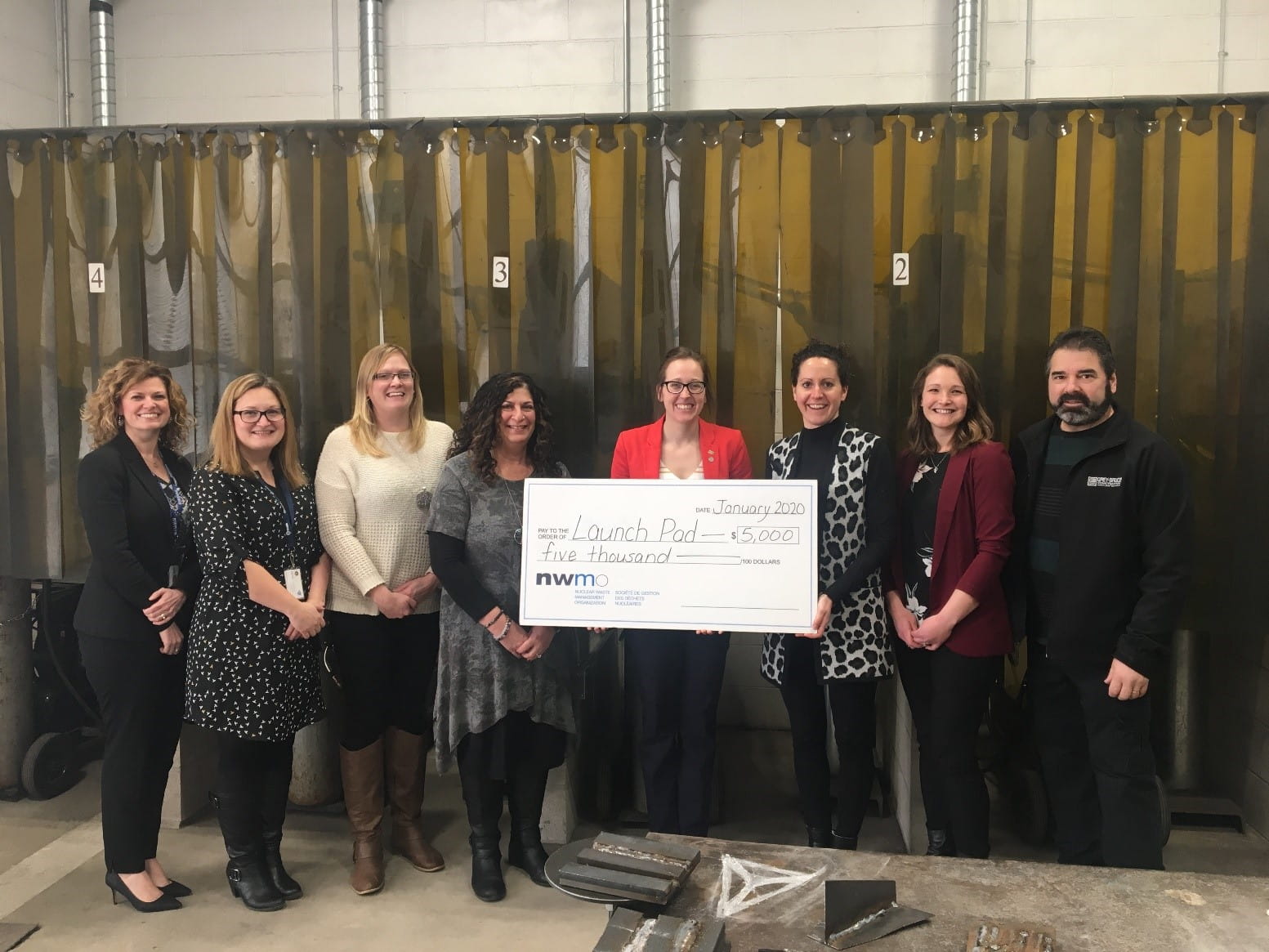 From left: Andrea Rideout, Leader of Experiential Learning at the Bluewater District School Board; Jocelyn Auger, Experiential Learning Instructional Leadership Consultant at the Bruce-Grey Catholic District School Board; Elyse Dewar, Huron-Kinloss Nuclear Waste Community Advisory Committee Coordinator; Mary Rose Walden, Huron-Kinloss Chief Administrative Officer; Emily Morrison, Launch Pad Executive Director; Cherie Leslie, NWMO Senior Engagement Advisor; Vivian Kennedy, South Bruce Community Liaison Committee Coordinator; and Mike Niesen, South Bruce Councillor.
