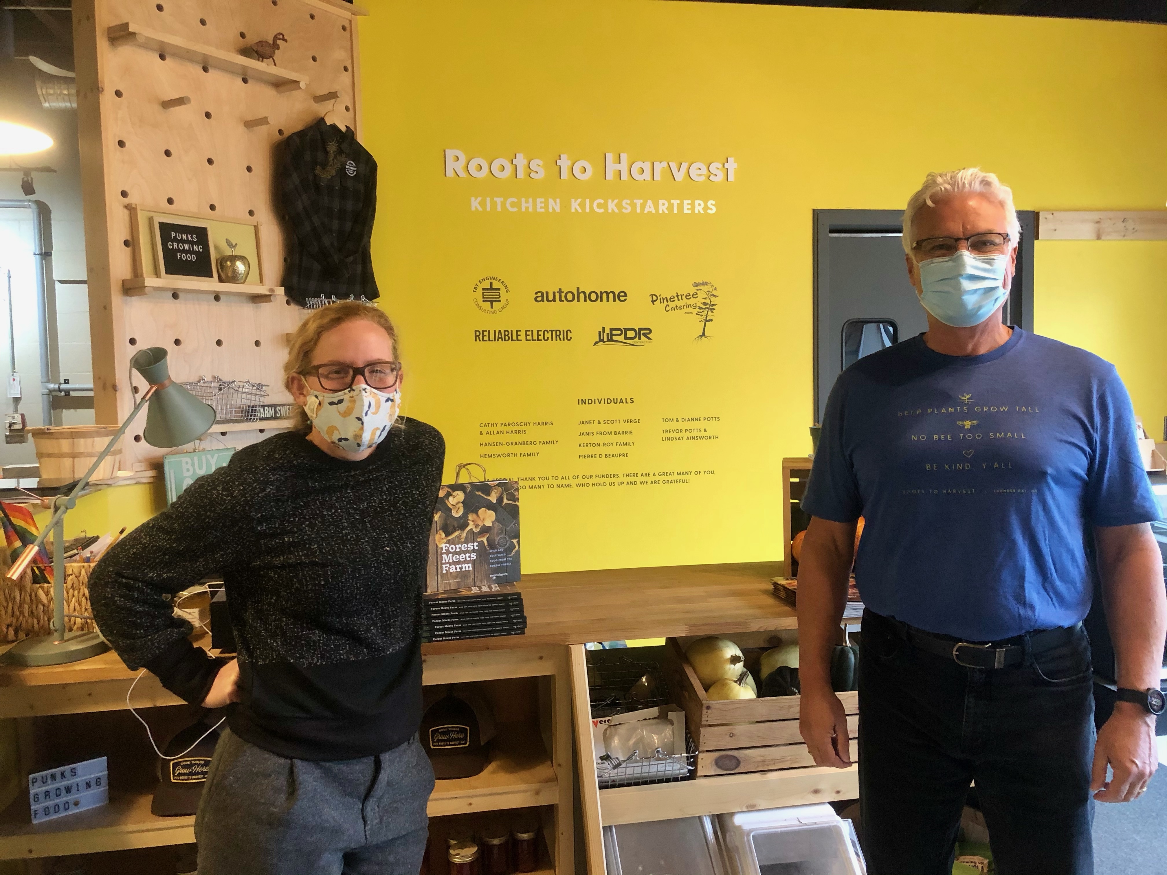 Two people standing next to each other